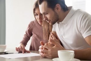 couple reviewing loan contract